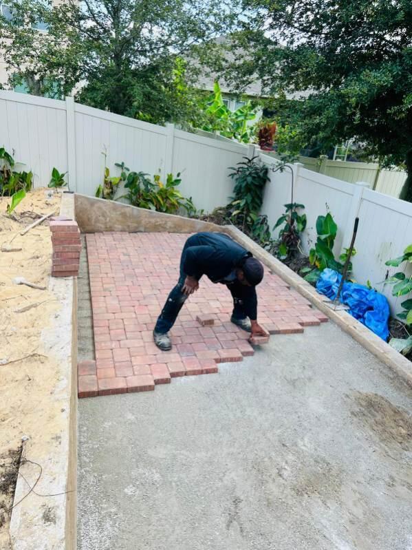 Plenty Pavers crew assessing a project site